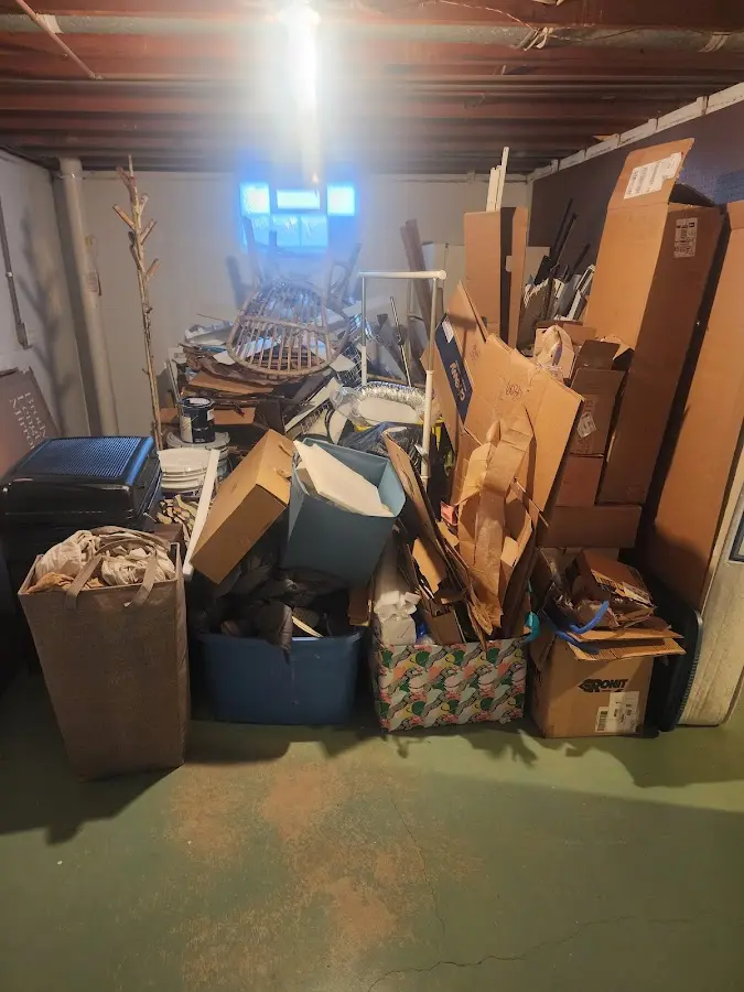 Roll-off dumpster container at job site for Yard Waste Dumpster Rental in Waterford